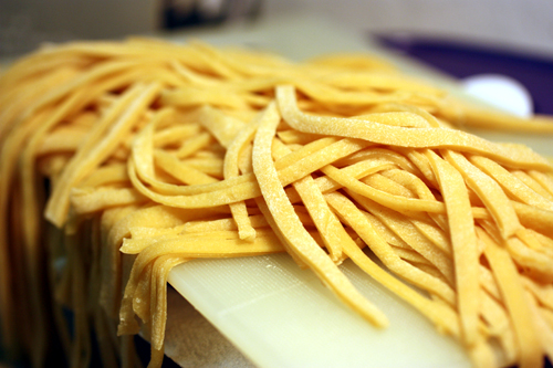 raw pasta laid out in its fresh cut beauty