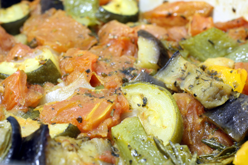 A big pot of roasted ratatouille, steaming and ready to enjoy.