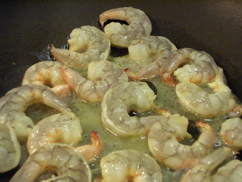 Shrimp still raw on one side, some of the sauce got into the pan. 